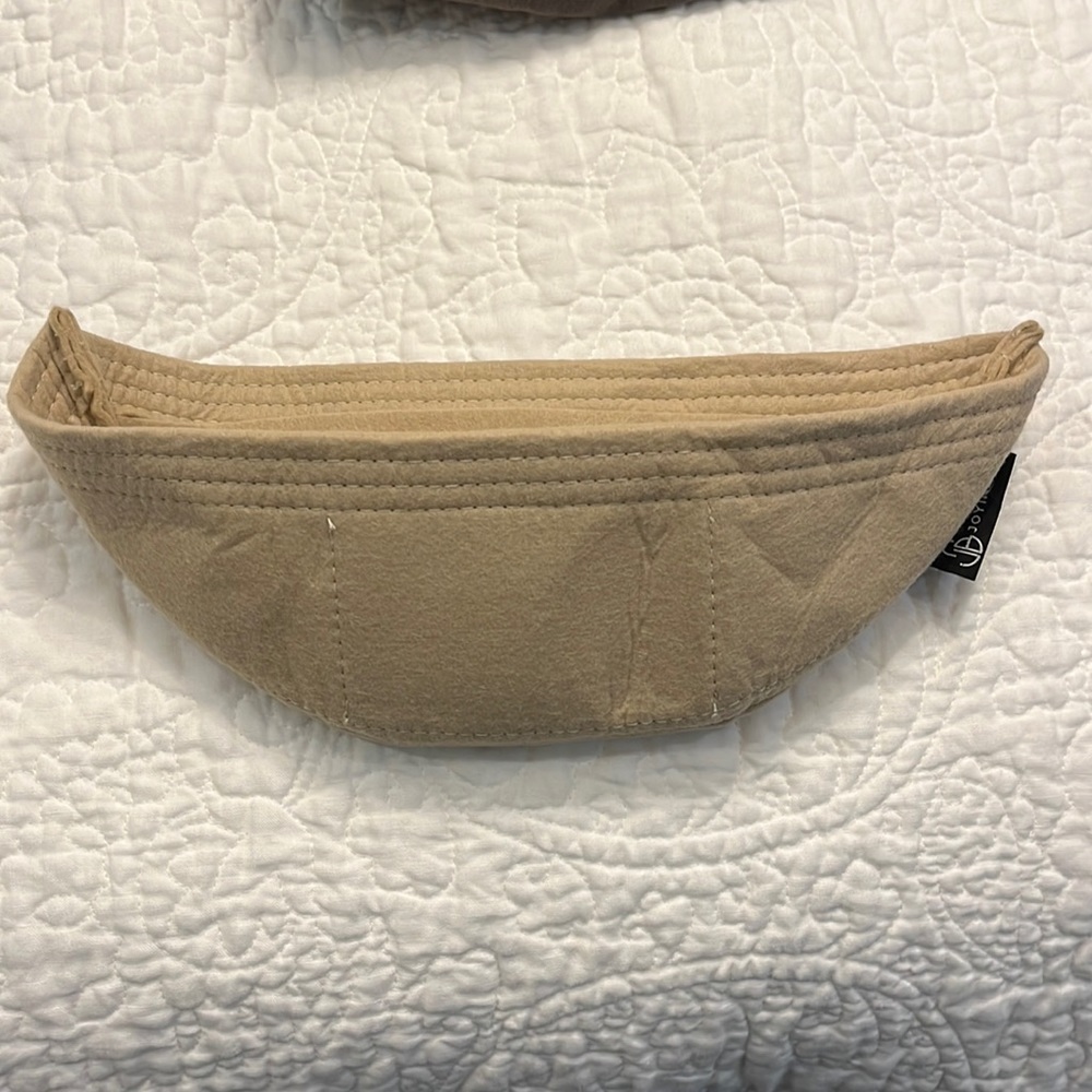 Louis Vuitton bum bag organizer.